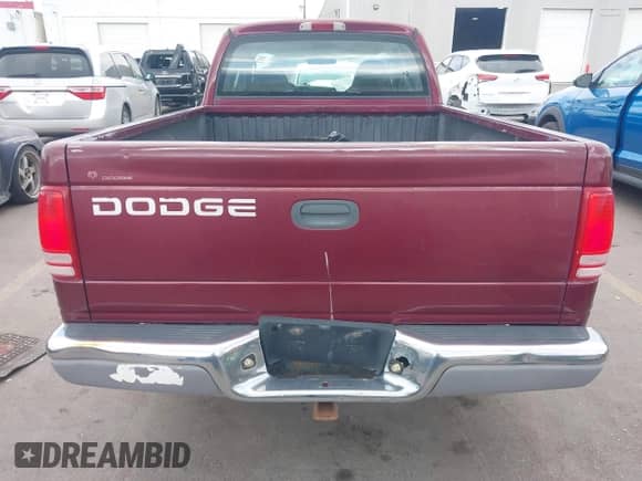 2000 Dodge Dakota Sport with VIN 1B7GL22N7YS528869, listed as a IAAI auction lot 42180439 with 169,150 mi miles and . Bid and sale history available at DreamBid. Image 16.
