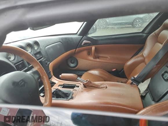 1999 Dodge Viper RT/10 с VIN 1B3ER65E0XV504078, выставлен на аукционе Copart как лот 54338855 с пробегом Не указан миль и На запчасти • Non repairable. История ставок и продаж доступна на DreamBid. Изображение 7.