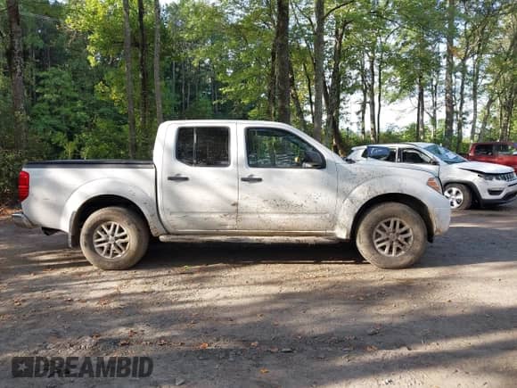 2017 Nissan Frontier SV z VIN 1N6AD0EV0HN738650, wystawiony jako IAAI lot #43083511 z przebiegiem 116 840 mil mil oraz . Historia ofert i sprzedaży dostępna na DreamBid. Obrazek 13.