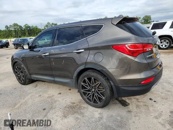 2013 Hyundai Santa Fe Sport с VIN 5XYZWDLA5DG003204, выставлен на аукционе Copart как лот 67432975 с пробегом 148 335 миль миль и Списание • Salvage title. История ставок и продаж доступна на DreamBid. Изображение 2.