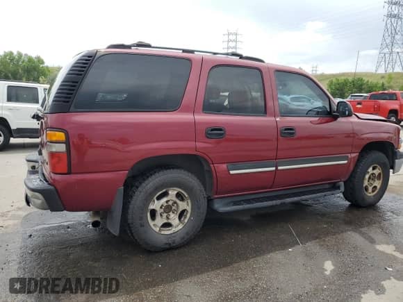 2005 Chevrolet Tahoe LS z VIN 1GNEK13TX5J176185, wystawiony jako Copart lot #62342385 z przebiegiem 172 161 mil mil oraz Szkoda całkowita • Salvage title. Historia ofert i sprzedaży dostępna na DreamBid. Obrazek 3.