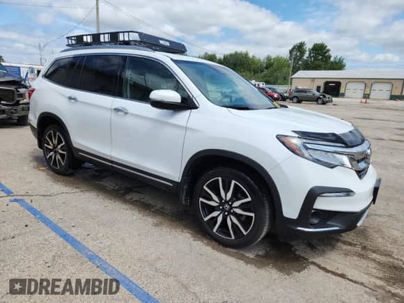 2022 Honda Pilot Elite z VIN 5FNYF6H09NB029904, wystawiony jako Copart lot #69220035 z przebiegiem 53 946 mil mil oraz Szkoda całkowita • Salvage title. Historia ofert i sprzedaży dostępna na DreamBid. Obrazek 4.