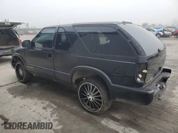 2002 Chevrolet Blazer LS с VIN 1GNCS18WX2K134115, выставлен на аукционе Copart как лот 70031785 с пробегом 179 669 миль миль и На запчасти • Non repairable. История ставок и продаж доступна на DreamBid. Изображение 2.