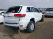 2020 Jeep Grand Cherokee Laredo E with VIN 1C4RJEAG4LC245884, listed as a IAAI auction lot 42564754 with 63,356 mi miles and . Bid and sale history available at DreamBid. Image 4.