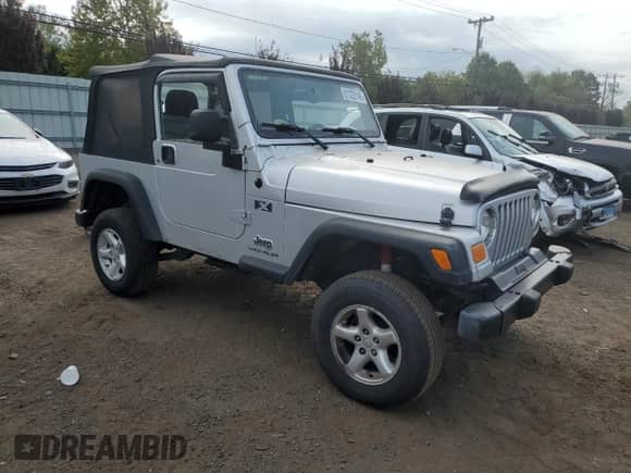 2005 Jeep Wrangler X with VIN 1J4FA39S35P323755, listed as a Copart auction lot 81223145 with 150,964 mi miles and Salvage title. Bid and sale history available at DreamBid. Image 4.