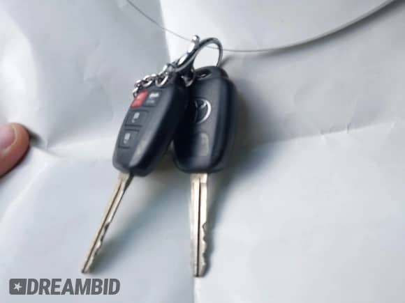 2014 Toyota Camry XLE with VIN 4T4BF1FK2ER354562, listed as a IAAI auction lot 43554838 with 197,062 mi miles and . Bid and sale history available at DreamBid. Image 11.