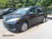 2017 Toyota Sienna XLE with VIN 5TDDZ3DC8HS182813, listed as a IAAI auction lot 43013976 with 124,184 mi miles and . Bid and sale history available at DreamBid. Image 2.