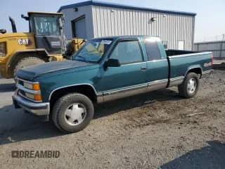 1998 Chevrolet Silverado 1500 with VIN 2GCEK19RXW1116889, listed as a Copart auction lot 70948515 with 238,720 mi miles and Salvage title. Bid and sale history available at DreamBid. Image 1.