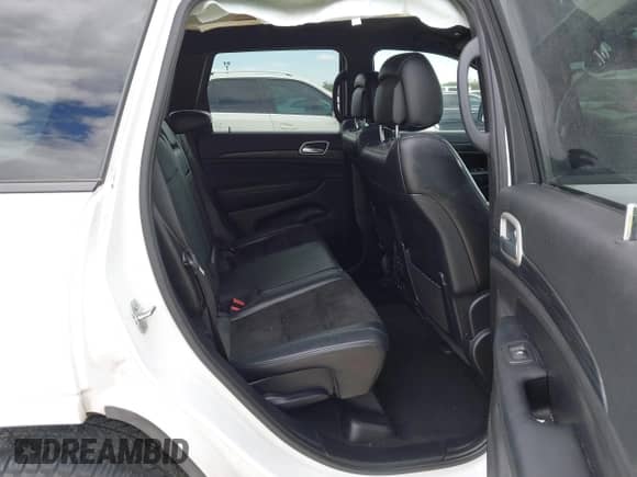 2020 Jeep Grand Cherokee Laredo E with VIN 1C4RJEAG9LC306226, listed as a IAAI auction lot 42839164 with 139,980 mi miles and . Bid and sale history available at DreamBid. Image 8.