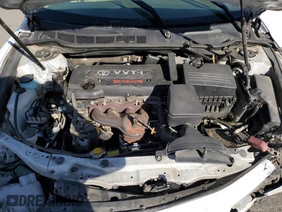 2007 Toyota Camry XLE z VIN 4T1BE46K67U630923, wystawiony jako Copart lot #82008635 z przebiegiem 89 494 mil mil oraz Szkoda całkowita • Salvage title. Historia ofert i sprzedaży dostępna na DreamBid. Obrazek 11.