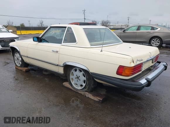1983 Mercedes-Benz 380 SL with VIN WDBBA45A4DB026088, listed as a IAAI auction lot 41783726 with 239,227 mi miles and . Bid and sale history available at DreamBid. Image 3.