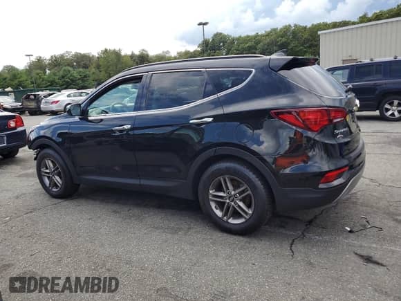 2018 Hyundai Santa Fe 2.4L with VIN 5XYZUDLB5JG528192, listed as a Copart auction lot 70378765 with 108,068 mi miles and Salvage title. Bid and sale history available at DreamBid. Image 2.