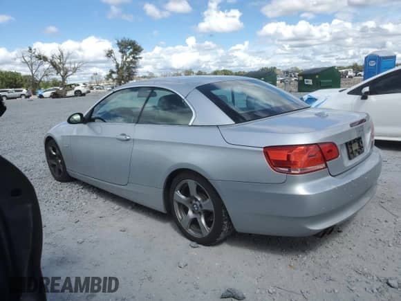 2009 BMW 3 Series 328i with VIN WBAWR33599P460929, listed as a Copart auction lot 84867615 with 123,688 mi miles and Salvage title. Bid and sale history available at DreamBid. Image 2.
