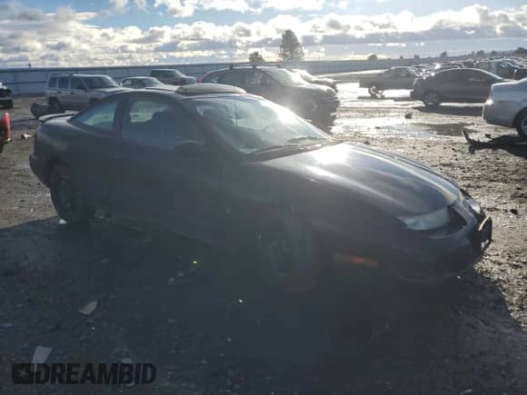 2000 Saturn SC с VIN 1G8ZY1273YZ152453, выставлен на аукционе Copart как лот 84834784 с пробегом Не указан миль и Списание • Salvage title. История ставок и продаж доступна на DreamBid. Изображение 4.