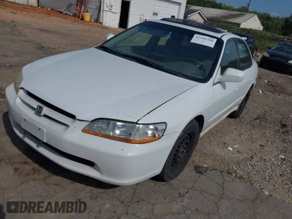 1999 Honda Accord EX with VIN 1HGCG165XXA022773, listed as a IAAI auction lot 43295768 with 294,333 mi miles and . Bid and sale history available at DreamBid. Image 2.