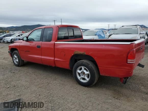 1998 Dodge Dakota SLT z VIN 1B7GL22X4WS573038, wystawiony jako Copart lot #44205935 z przebiegiem 126 293 mil mil oraz Czysty tytuł • Clean title. Historia ofert i sprzedaży dostępna na DreamBid. Obrazek 2.