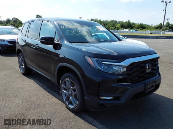 2023 Honda Passport EX-L with VIN 5FNYF8H51PB009494, listed as a IAAI auction lot 42751895 with 24,085 mi miles and . Bid and sale history available at DreamBid. Image 1.