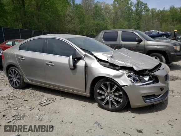 2015 Volvo S60 T6 Drive-E with VIN YV149MFK0F1351673, listed as a Copart auction lot 54271335 with 127,098 mi miles and Salvage title. Bid and sale history available at DreamBid. Image 4.