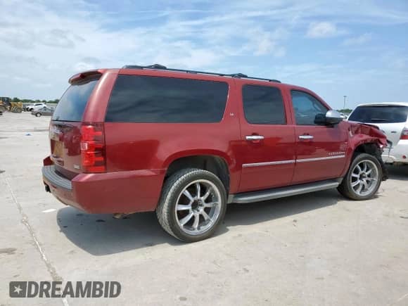2011 Chevrolet Suburban LT z VIN 1GNSCJE02BR129006, wystawiony jako Copart lot #59472455 z przebiegiem 216 817 mil mil oraz Szkoda całkowita • Salvage title. Historia ofert i sprzedaży dostępna na DreamBid. Obrazek 3.