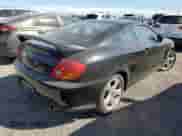 2004 Hyundai Tiburon GT with VIN KMHHN65F54U133867, listed as a Copart auction lot 75287514 with Not provided miles and Salvage title. Bid and sale history available at DreamBid. Image 3.