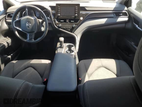 2023 Toyota Camry LE z VIN 4T1C11AK8PU829929, wystawiony jako Copart lot #71752915 z przebiegiem 49 591 mil mil oraz Szkoda całkowita • Salvage title. Historia ofert i sprzedaży dostępna na DreamBid. Obrazek 8.