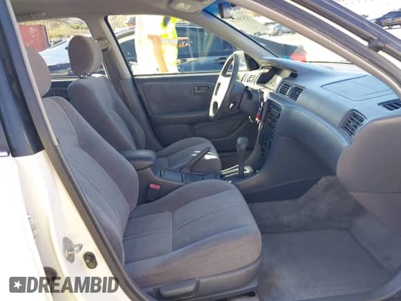 2000 Toyota Camry LE z VIN JT2BG22KXY0428953, wystawiony jako IAAI lot #43458115 z przebiegiem 158 994 mil mil oraz . Historia ofert i sprzedaży dostępna na DreamBid. Obrazek 5.