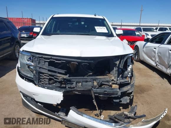 2015 Chevrolet Tahoe LS with VIN 1GNSCAKC5FR119378, listed as a IAAI auction lot 41759734 with Not provided miles and . Bid and sale history available at DreamBid. Image 12.