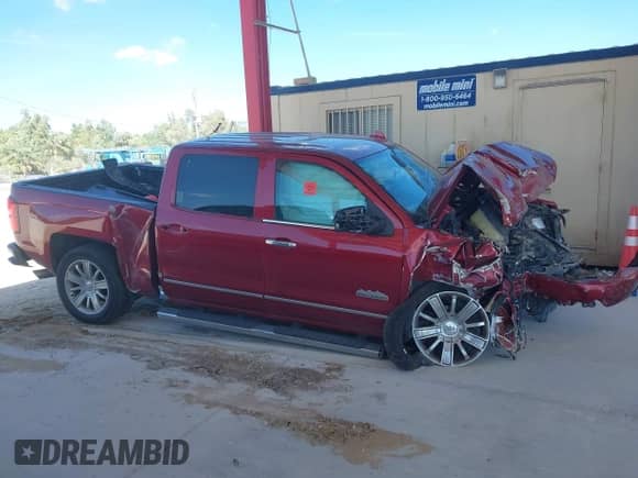 2018 Chevrolet Silverado 1500 High Country with VIN 3GCPCTEC2JG615429, listed as a IAAI auction lot 41855416 with Not provided miles and . Bid and sale history available at DreamBid. Image 13.