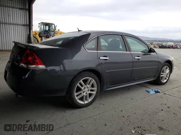 2013 Chevrolet Impala LTZ with VIN 2G1WC5E31D1196700, listed as a Copart auction lot 84242875 with 142,252 mi miles and Clean title. Bid and sale history available at DreamBid. Image 3.