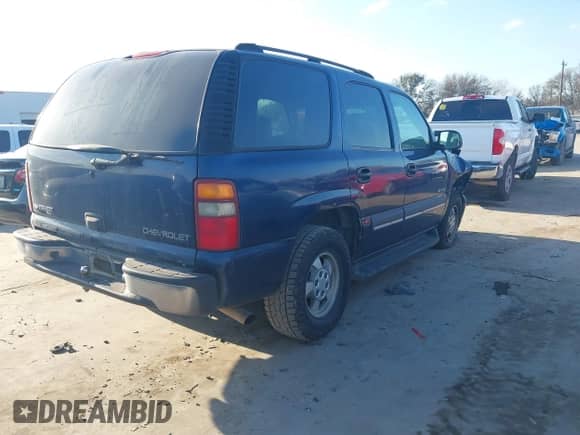 2003 Chevrolet Tahoe LT z VIN 1GNEC13Z23R186855, wystawiony jako IAAI lot #41488749 z przebiegiem 314 270 mil mil oraz . Historia ofert i sprzedaży dostępna na DreamBid. Obrazek 4.