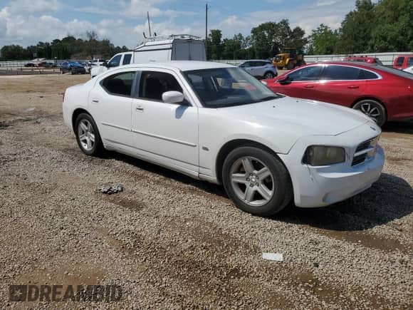2010 Dodge Charger SXT z VIN 2B3CA3CV1AH257542, wystawiony jako Copart lot #71813644 z przebiegiem 164 672 mil mil oraz Szkoda całkowita • Salvage title. Historia ofert i sprzedaży dostępna na DreamBid. Obrazek 4.