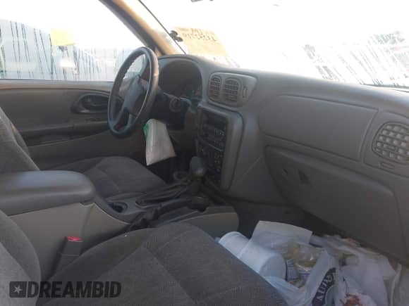 2004 Chevrolet TrailBlazer LS with VIN 1GNDS13S642155197, listed as a IAAI auction lot 43252719 with Not provided miles and . Bid and sale history available at DreamBid. Image 5.