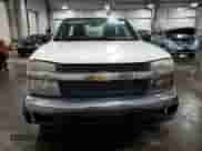 2011 Chevrolet Colorado Work Truck z VIN 1GCCSBF98B8119542, wystawiony jako Copart lot #55825545 z przebiegiem 75 939 mil mil oraz Szkoda całkowita • Salvage title. Historia ofert i sprzedaży dostępna na DreamBid. Obrazek 5.