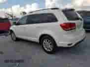 2015 Dodge Journey SXT with VIN 3C4PDCBBXFT595146, listed as a Copart auction lot 68080395 with 205,925 mi miles and Salvage title. Bid and sale history available at DreamBid. Image 2.