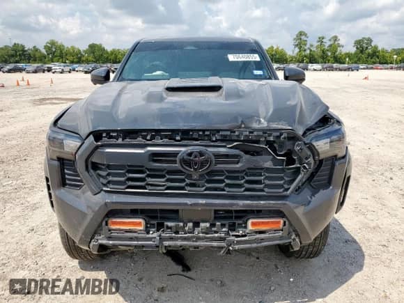 2024 Toyota Tacoma SR5 with VIN 3TMLB5JN1RM024042, listed as a Copart auction lot 70640855 with 23,853 mi miles and Salvage title. Bid and sale history available at DreamBid. Image 5.