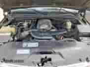 2002 Chevrolet Tahoe LS z VIN 1GNEC13V72R157234, wystawiony jako Copart lot #71055205 z przebiegiem 271 885 mil mil oraz Czysty tytuł • Clean title. Historia ofert i sprzedaży dostępna na DreamBid. Obrazek 11.