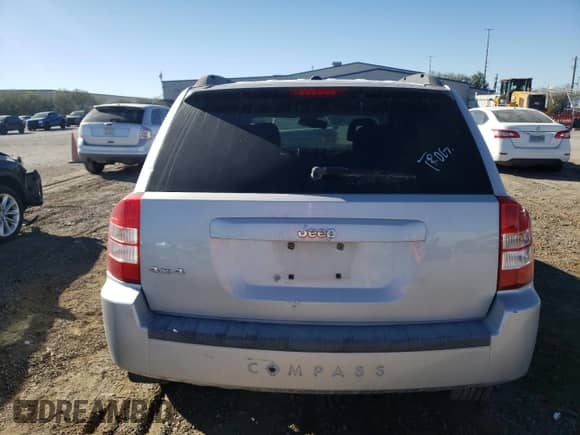 2007 Jeep Compass Sport with VIN 1J8FF47W47D136671, listed as a Copart auction lot 69504735 with Not provided miles and Salvage title. Bid and sale history available at DreamBid. Image 6.