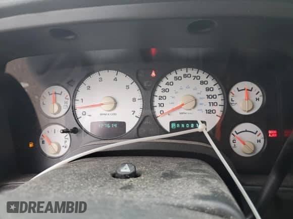 2002 Dodge 1500 с VIN 3D7HU18N72G127071, выставлен на аукционе Copart как лот 81085975 с пробегом 127 614 миль миль и Списание • Salvage title. История ставок и продаж доступна на DreamBid. Изображение 9.