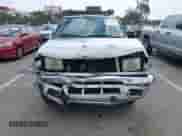 1998 Nissan Frontier XE z VIN 1N6DD26S6WC383876, wystawiony jako IAAI lot #42327403 z przebiegiem 189 535 mil mil oraz . Historia ofert i sprzedaży dostępna na DreamBid. Obrazek 6.