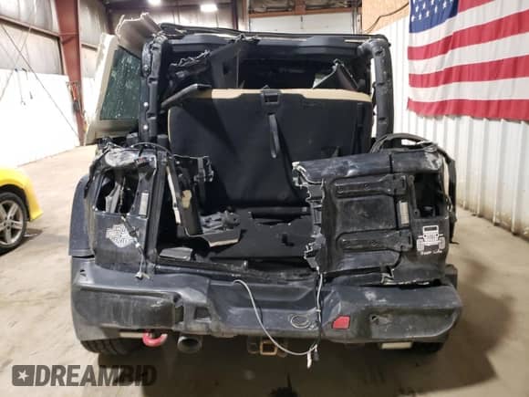 2018 Jeep Wrangler Rubicon with VIN 1C4HJXCG5JW257607, listed as a Copart auction lot 42244455 with 52,887 mi miles and Salvage title. Bid and sale history available at DreamBid. Image 6.