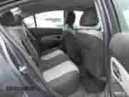 2014 Chevrolet Cruze LS z VIN 1G1PA5SG5E7279519, wystawiony jako IAAI lot #43456106 z przebiegiem 142 862 mil mil oraz . Historia ofert i sprzedaży dostępna na DreamBid. Obrazek 8.