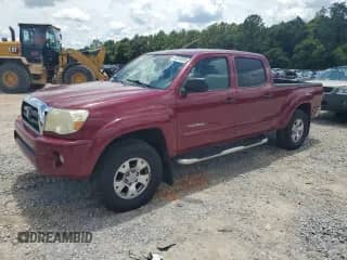 2008 Toyota Tacoma PreRunner with VIN 3TMKU72N08M014245, listed as a Copart auction lot 63310995 with 137,215 mi miles and Salvage title. Bid and sale history available at DreamBid. Image 1.