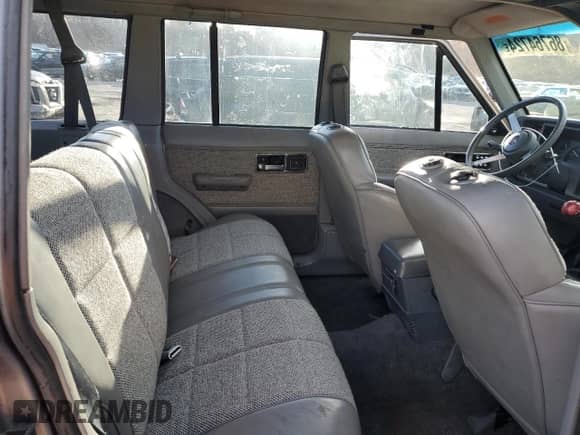 1992 Jeep Grand Cherokee with VIN 1J4FJ58S8NL233005, listed as a Copart auction lot 86764724 with 134,245 mi miles and Clean title. Bid and sale history available at DreamBid. Image 11.