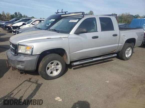 2008 Dodge Dakota SXT с VIN 1D7HW38K58S629008, выставлен на аукционе Copart как лот 83822875 с пробегом 75 428 миль миль и Чистый • Clean title. История ставок и продаж доступна на DreamBid. Изображение 1.
