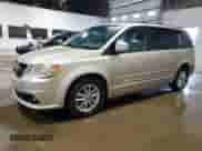2014 Dodge Grand Caravan SXT with VIN 2C4RDGCG1ER253516, listed as a Copart auction lot 69698965 with 155,334 mi miles and Clean title. Bid and sale history available at DreamBid. Image 1.