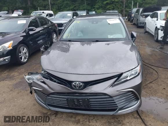 2023 Toyota Camry LE z VIN 4T1C11AK3PU141255, wystawiony jako IAAI lot #42938395 z przebiegiem 59 258 mil mil oraz . Historia ofert i sprzedaży dostępna na DreamBid. Obrazek 13.