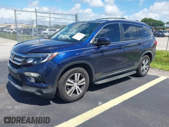 2017 Honda Pilot EX-L with VIN 5FNYF5H52HB019855, listed as a IAAI auction lot 43366867 with 121,526 mi miles and . Bid and sale history available at DreamBid. Image 2.