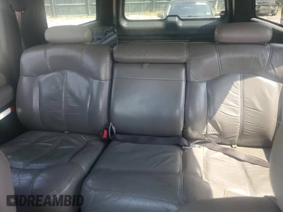 2002 Chevrolet Suburban LT z VIN 1GNFK16Z72J122181, wystawiony jako Copart lot #65336824 z przebiegiem 298 076 mil mil oraz Szkoda całkowita • Salvage title. Historia ofert i sprzedaży dostępna na DreamBid. Obrazek 10.