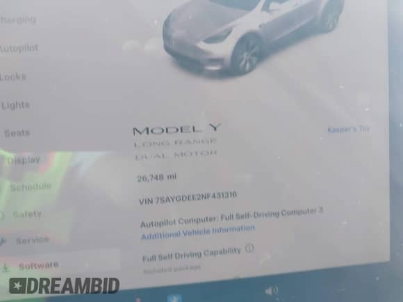 2022 Tesla Model Y Long Range z VIN 7SAYGDEE2NF431316, wystawiony jako IAAI lot #42625983 z przebiegiem 26 748 mil mil oraz . Historia ofert i sprzedaży dostępna na DreamBid. Obrazek 7.