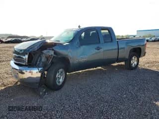 2013 Chevrolet Silverado 1500 LT with VIN 1GCRCSE06DZ215810, listed as a Copart auction lot 85534555 with 148,151 mi miles and Salvage title. Bid and sale history available at DreamBid. Image 1.